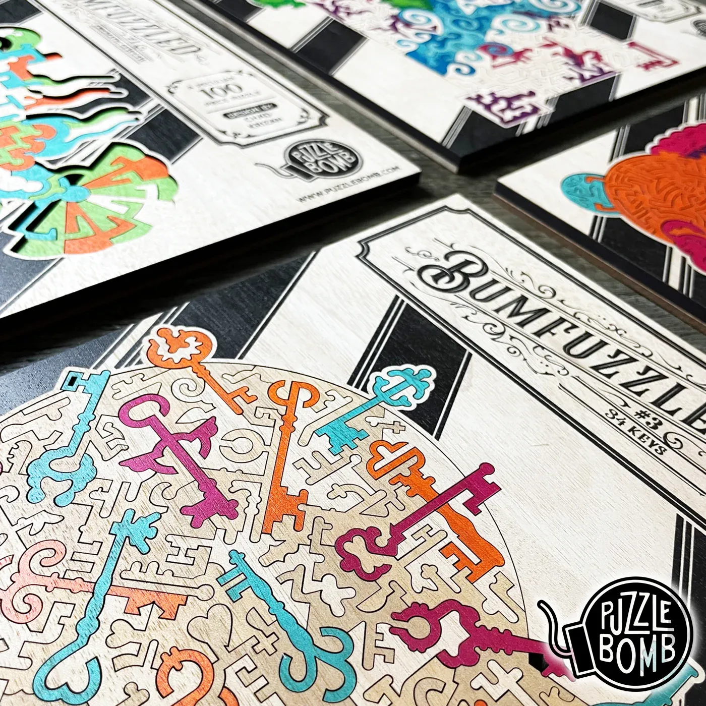 Parts of the first four Bumfuzzled puzzles, along with the Puzzle Bomb logo