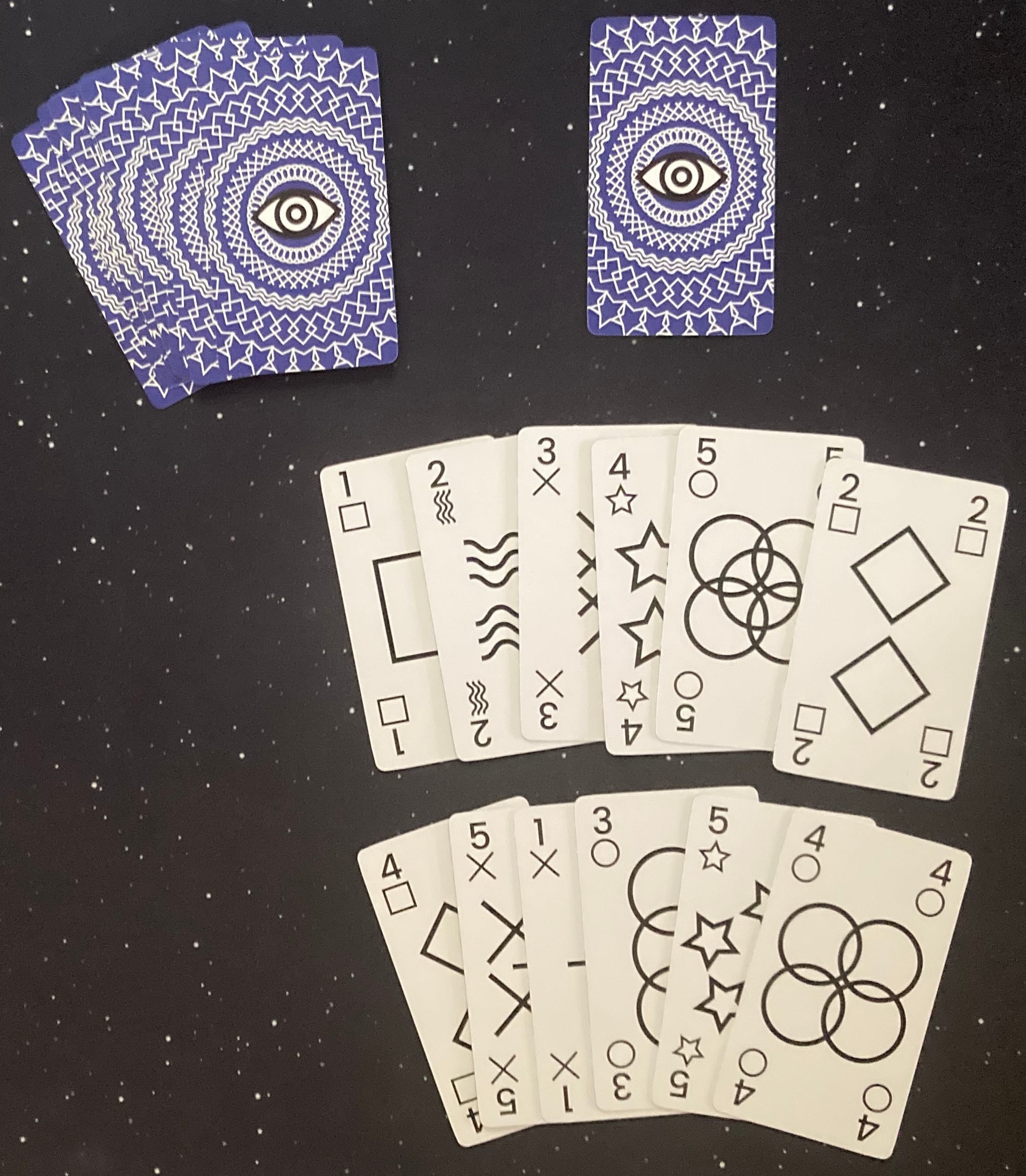 Cards show values of 1-5 across five suits