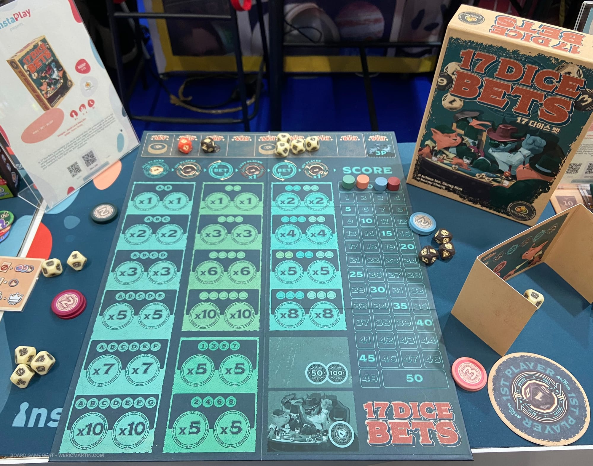 Front cover of 17 Dice Bets, along with dice and the game board showing the possible bets and payouts