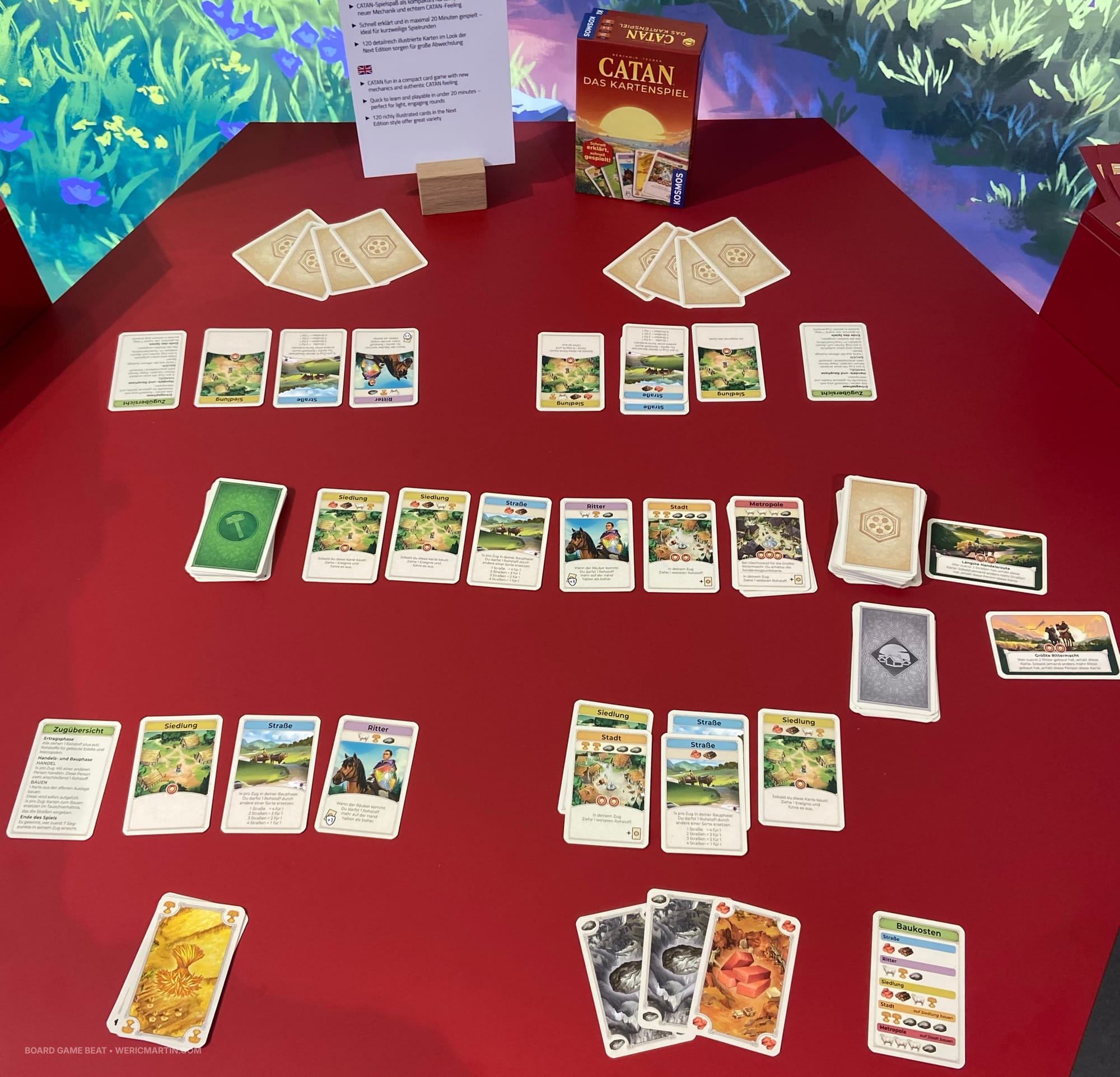 Sample cards from CATAN: Das Kartenspiel, with all the familiar CATAN elements: bricks, ore, knights, settlements, roads, and so on