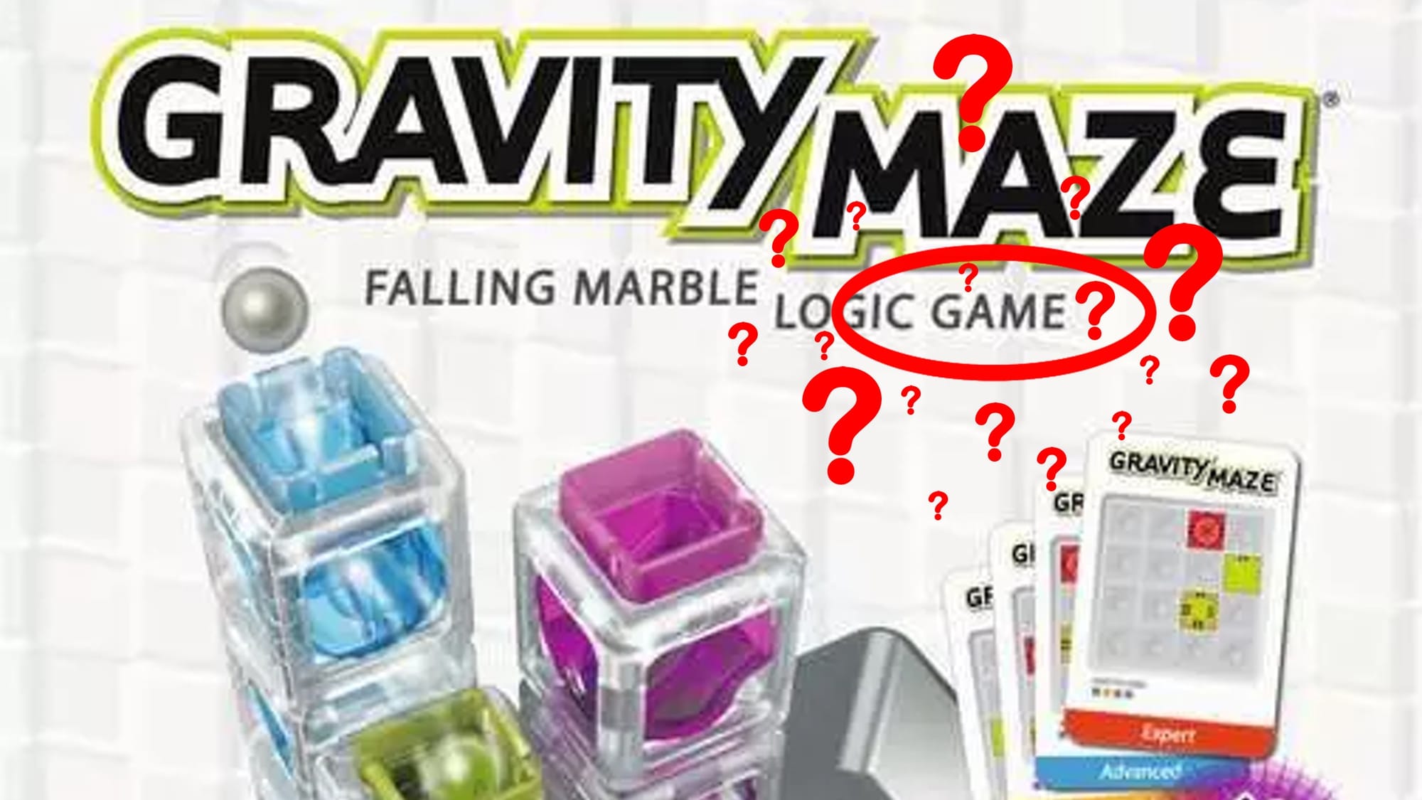 Half of the cover of Gravity Maze, with many red question marks near the word "game" in the description