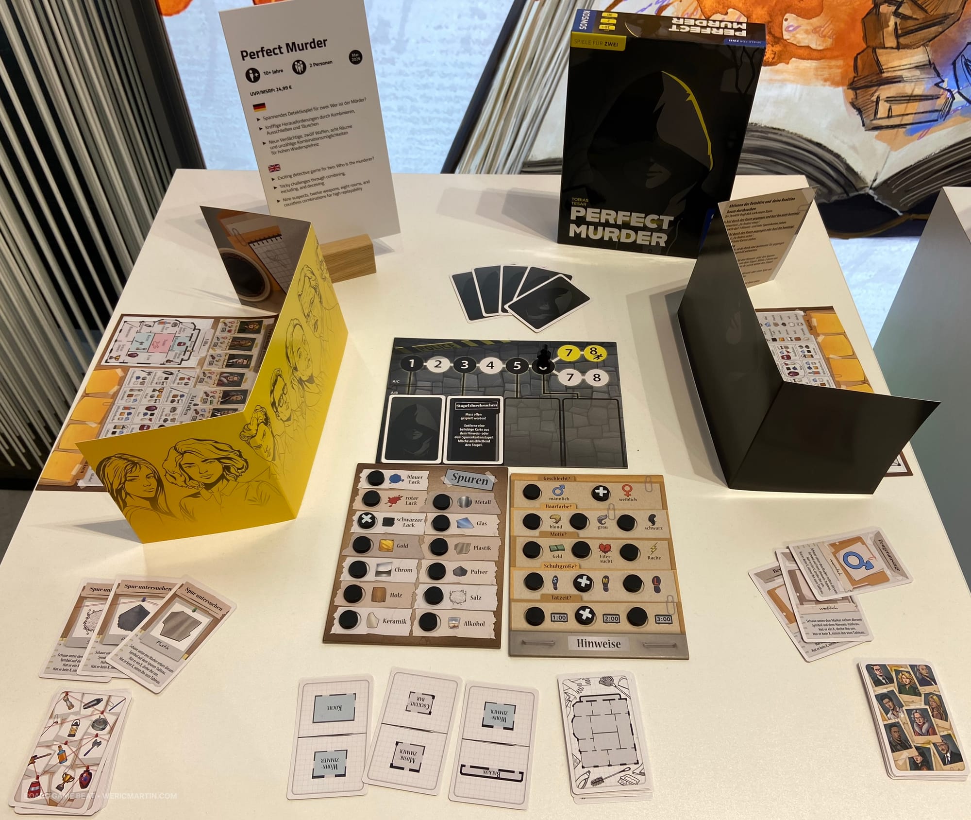 Each player has a screen to hide information they know or learn, with shared decks of cards and a central playing board for tracking public information