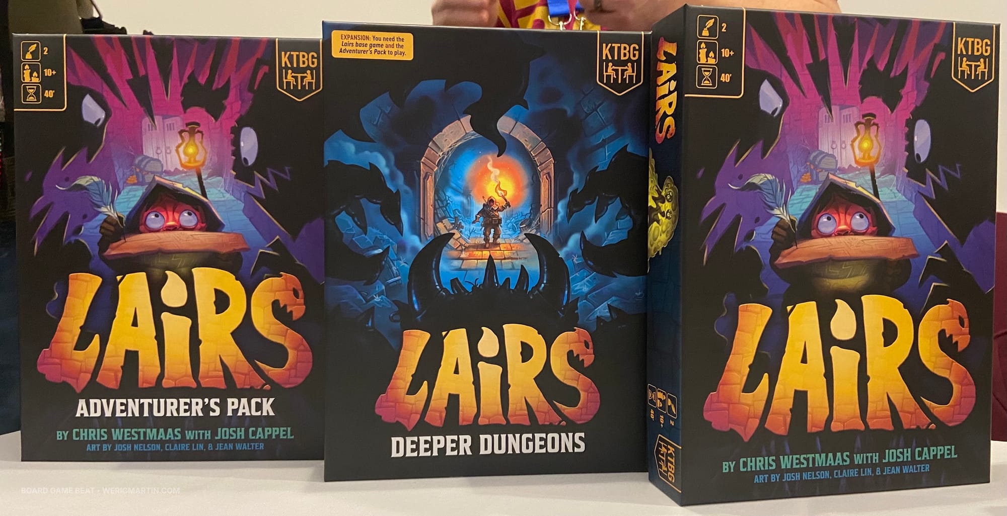 From left: Lairs: Adventurer's Pack, Lairs: Deeper Dungeons, and Lairs